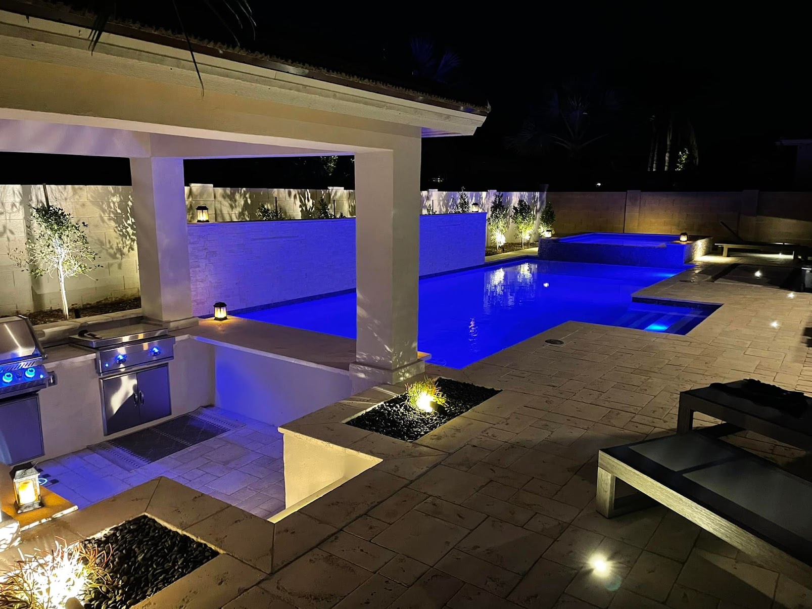 Luxury pool with swim-up bar and outdoor kitchen